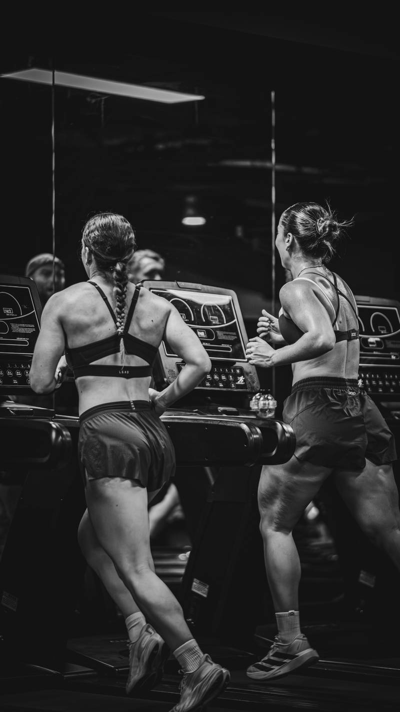 Members running the treadmill block